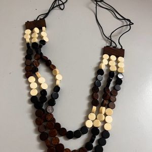 Long wooden three layered chain