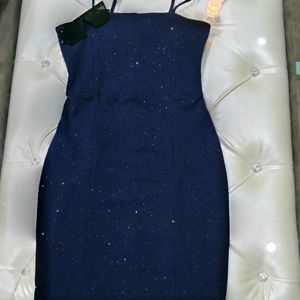 A navy blue coloured bodycon mini dress