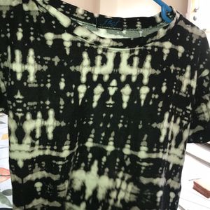 a Black charcoal tie dye type Crop Top