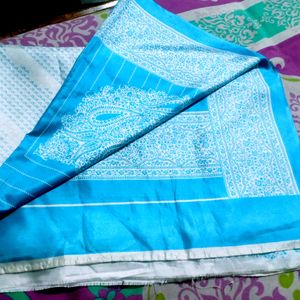 A Blue Silk Saree With Blouse And Peticoat