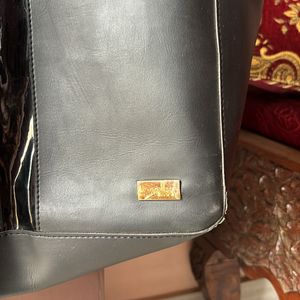 Yelloe Black Handbag