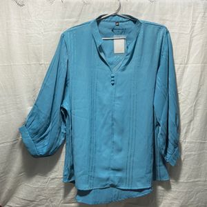 Light teal blue colour top, fresh piece with tags