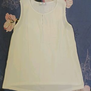 White Sleeveless Tops