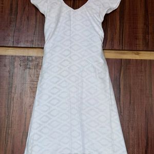 Printed white coloured Kurti.