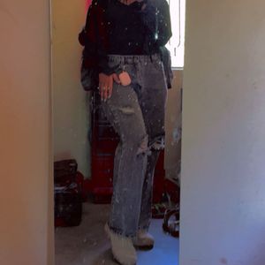 Acid washed distressed black oversized jeans