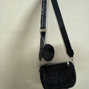 Black Coin Sling Bag.