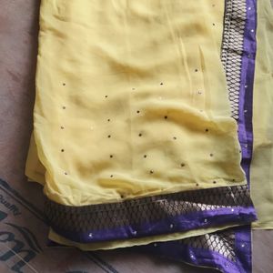 Yellow Saree With Purple Border