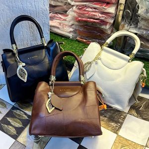 Handbags In Three Different Shades