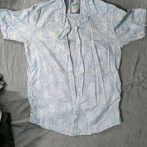 A Light Blue Color Shirt