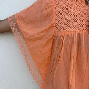 Beautiful Orange Top With Unique Hand Design