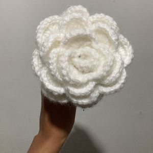 white crocheted rose