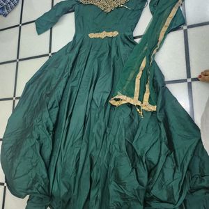 Luxurious Silk Dark Green Gown With Golden Stone