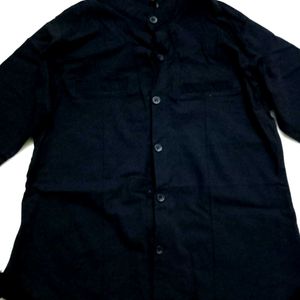 A Black Shirt With Good Or Excellent Quality.