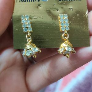 Golden Jhumki Earrings With Silver Stones