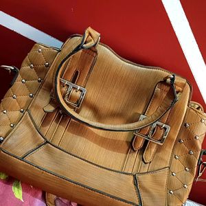 Fancy And Stylish Wooden Touch Handbag