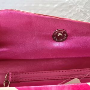 Pink & white Clutch with a silver sling