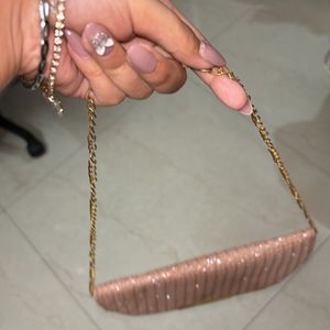 Pink Shimmery Sling Bag.