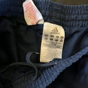 Adidas blue trackpants