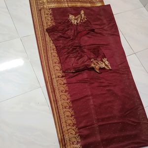 Beautiful maroon and back side golden  Silk Saree.