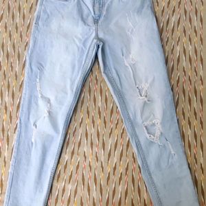 Distressed Blue Jeans With 4 Pockets