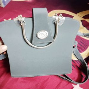 Grey Colour Handbag With Metal Handle