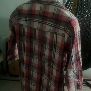 A pink white lining shirt