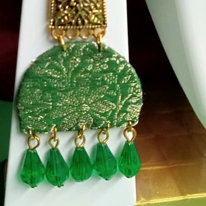 green design earrings