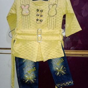 Denim Jeans With Yellow Top.