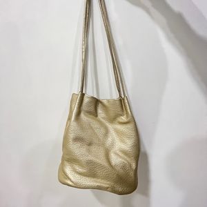 Golden Big Potli Shaped Bag