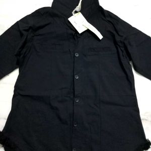 A Black Shirt With Good Or Excellent Quality.