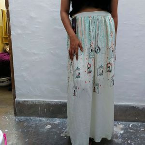 CHUMBAK off-white and green printed maxi skirt