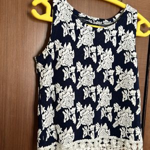 Sleeveless Top With Hanging Design