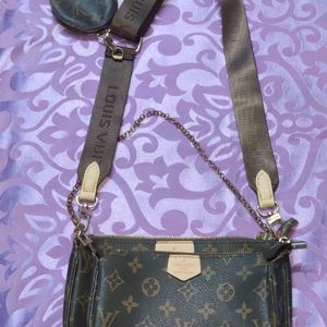 Brand New Louis Vuitton Multi Pouchtte Sling Bag..