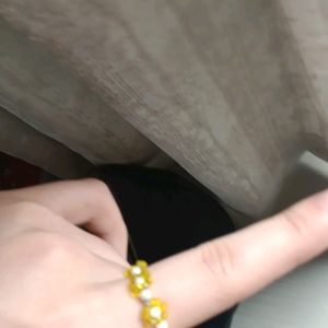 BEADED YELLOW RING FLOWER