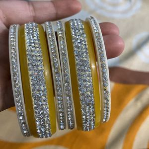 yellow seep bangles new not used