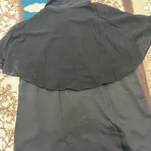 Black sleeveless satin shirt