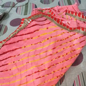 A Peach Colour Saree With Beutiful Red Strips