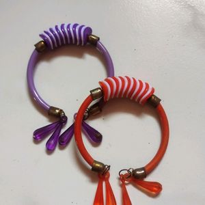 2 Piece Of Purple And Orange Coloured Bracelet