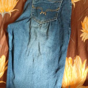 Washed Out Jeans With Obvious Flaws.