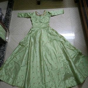 Pista Green & Golden Net Gown (New)