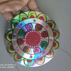 A pair of diya holders