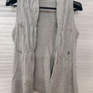 Grey Sleeveless Shrug With Button Holds