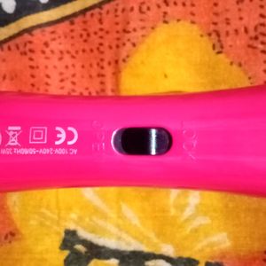 Electric Hair Curler And Straightener