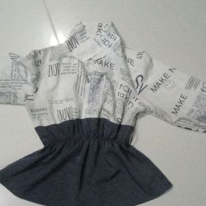 A Elegant "Newspaper" Top