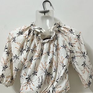 Branded Oomph floral top