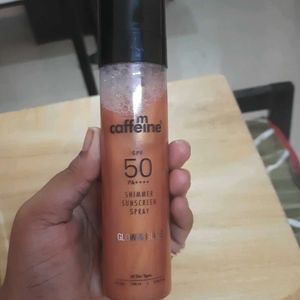 A shimmer sunscreen spray with Spf50 ,PA++++