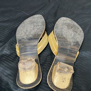 Golden Sandal With Very Little Heal