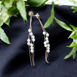 Long White Earrings.