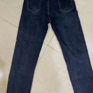 Dark Blue Raw Hem High Rise Denims.