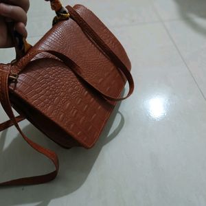 Brown purse sling